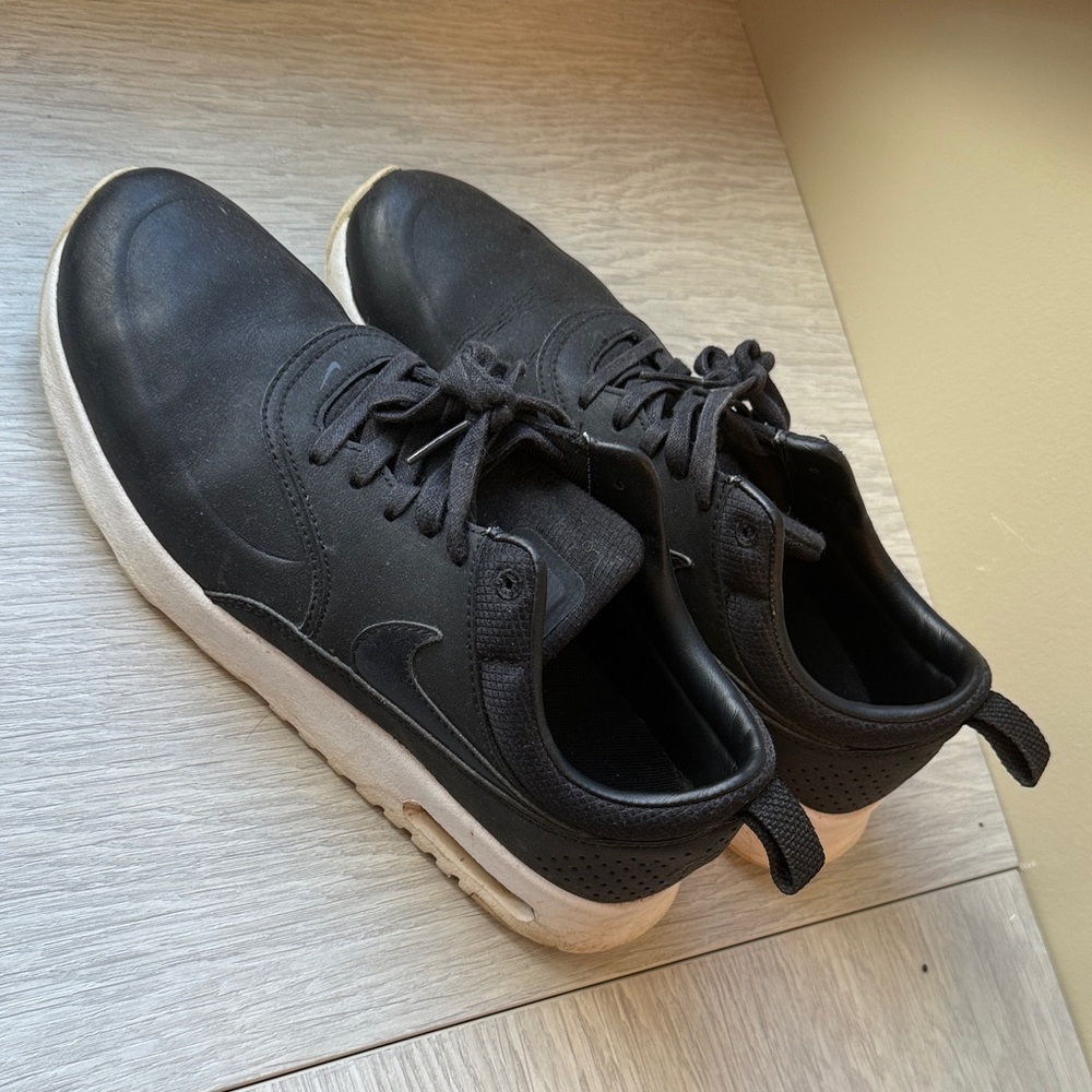 Nike Women’s Black Sneakers with White Sole